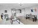 Living room showing open floor plan, dining area and neutral decor at 2354 Cactus Bloom Ct, Castle Rock, CO 80109