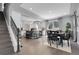 Open-concept kitchen and dining area featuring modern appliances, countertops, and stylish decor at 2354 Cactus Bloom Ct, Castle Rock, CO 80109