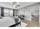 Sunlit main bedroom with a cozy rug and stylish decor, creating a relaxing retreat within the home at 2354 Cactus Bloom Ct, Castle Rock, CO 80109