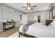 Comfortable main bedroom featuring modern furniture, large windows, and neutral decor at 2354 Cactus Bloom Ct, Castle Rock, CO 80109