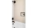 Contemporary shower with neutral tile, black hardware, and a built-in shelf, offering a spa-like experience at 2354 Cactus Bloom Ct, Castle Rock, CO 80109