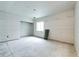 Unfinished basement featuring concrete floors, a window, and potential for customization at 129 S Waterloo St, Aurora, CO 80018