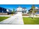 Beautiful two-story home featuring stone accents, a welcoming front porch, and well-manicured lawn at 129 S Waterloo St, Aurora, CO 80018