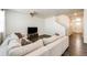 Bright living room with neutral decor, wood-look flooring, and a comfortable couch at 129 S Waterloo St, Aurora, CO 80018