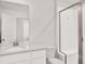 Bathroom featuring new vanity, chrome fixtures, and shower at 470 Kiowa Ave, Bennett, CO 80102