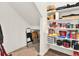 A pantry that has ample shelving for storage at 470 Kiowa Ave, Bennett, CO 80102