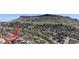Aerial view showcasing the home's location in a neighborhood nestled against a mountain backdrop at 602 5Th St, Golden, CO 80403