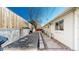 A tidy backyard featuring stone pavers, a privacy fence, and mountain views, perfect for outdoor relaxation and enjoyment at 602 5Th St, Golden, CO 80403