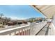 Balcony with scenic views of a lush green neighborhood and distant mountains at 602 5Th St, Golden, CO 80403