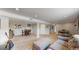 Spacious basement with neutral carpet and multiple seating areas at 602 5Th St, Golden, CO 80403