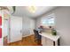 Functional room with hardwood flooring and neutral decor, perfect for use as a home office at 602 5Th St, Golden, CO 80403