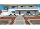 Charming two-story home showcasing a well-manicured front yard and updated facade at 602 5Th St, Golden, CO 80403