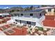 Well-maintained home exterior with solar panels, a deck, and landscaped front yard at 602 5Th St, Golden, CO 80403