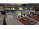 Charming two-story home with a covered porch, attached garage, and landscaped front yard at dusk at 602 5Th St, Golden, CO 80403
