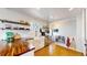 Bright kitchen featuring a farmhouse sink, open shelving, and stainless steel appliances at 602 5Th St, Golden, CO 80403