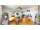 Bright living room with hardwood floors, a comfortable couch, and lots of natural light at 602 5Th St, Golden, CO 80403