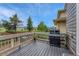 View of the grill and wood deck, perfect for outdoor cooking and entertaining with a great view at 3434 Fantasy Pl, Castle Rock, CO 80109