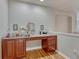 Vanity area features a built-in desk, drawers, cabinets, and hardwood floors at 3434 Fantasy Pl, Castle Rock, CO 80109