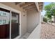 A small private balcony offers an outdoor retreat with stone flooring and partial views at 5765 W Atlantic Pl # 104, Lakewood, CO 80227