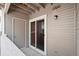 A small private balcony with storage or entry door offers an outdoor retreat with stone flooring at 5765 W Atlantic Pl # 104, Lakewood, CO 80227