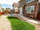 The outdoor space offers a yard, patio, and privacy fence, perfect for relaxing or entertaining at 5626 S Biloxi Way, Aurora, CO 80016