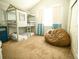 Playful bedroom with a bunk bed, bean bag, and plenty of natural light at 5626 S Biloxi Way, Aurora, CO 80016