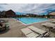 Community pool with ample seating and a pristine swimming area at 5626 S Biloxi Way, Aurora, CO 80016