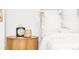 Bedroom detail showcasing a nightstand with decor, enhancing the room's inviting and stylish atmosphere at 1061 Adams St, Denver, CO 80206