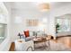 Bright living room with hardwood floors, stylish furniture, and ample natural light at 1061 Adams St, Denver, CO 80206