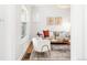Bright living room with hardwood floors, stylish furniture, and ample natural light at 1061 Adams St, Denver, CO 80206