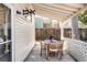 Covered patio with outdoor seating perfect for entertaining or relaxing in the backyard at 1061 Adams St, Denver, CO 80206