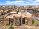 A high-angle captures this property's prime city location amidst the vibrant urban landscape and mountain views at 1233 N Ogden St # 610, Denver, CO 80218