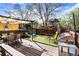 Backyard with a wood deck area and a dining set and multiple chair options at 1233 N Ogden St # 610, Denver, CO 80218