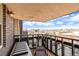 Relax on the balcony with a bench and chair, offering city views and an outdoor light at 1233 N Ogden St # 610, Denver, CO 80218