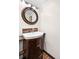 Bathroom features vanity with bronze fixtures, drawers and cabinet storage at 1233 N Ogden St # 610, Denver, CO 80218