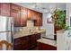 Kitchen features granite counters, stainless appliances, and wood cabinets for a sleek look at 1233 N Ogden St # 610, Denver, CO 80218