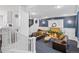 Stunning living room area with a fireplace, two sofas and a white staircase at 1233 N Ogden St # 610, Denver, CO 80218
