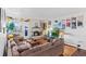 Inviting living room features a cozy fireplace, wood floors, and stylish decor throughout the space at 1233 N Ogden St # 610, Denver, CO 80218