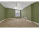 Well-lit bedroom with a large window and neutral carpet at 707 27Th St, Denver, CO 80205