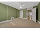 Bedroom with large windows and an open doorway to the rest of the home at 707 27Th St, Denver, CO 80205
