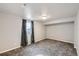 Bedroom featuring neutral walls, neutral carpet, and a window for natural light at 7814 W Ontario Pl, Littleton, CO 80128
