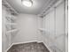 Walk-in closet with adjustable shelving for optimal storage at 7814 W Ontario Pl, Littleton, CO 80128