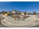 A charming corner lot home featuring manicured landscaping, stone features and two-car driveway at 7814 W Ontario Pl, Littleton, CO 80128