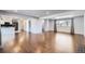 Open concept living room with hardwood floors, recessed lighting and an open transition into the kitchen at 7814 W Ontario Pl, Littleton, CO 80128