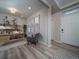 Home office area featuring a desk, stylish chair, and contemporary decor at 21947 E 51St Dr, Aurora, CO 80019
