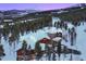Luxury mountain home with snow covered roof at 457 Timber Trail Rd, Breckenridge, CO 80424