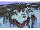 Luxury home nestled in a snowy mountain setting at 457 Timber Trail Rd, Breckenridge, CO 80424