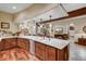 Open floor plan basement with a bar and lounge area at 457 Timber Trail Rd, Breckenridge, CO 80424