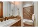 Bathroom with granite vanity and tiled shower/tub combo at 457 Timber Trail Rd, Breckenridge, CO 80424
