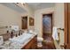 Elegant bathroom with granite vanity, large mirror, and tiled shower at 457 Timber Trail Rd, Breckenridge, CO 80424